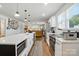 Bright open kitchen with an island that opens to the living room at 139 5Th St, Huntersville, NC 28078