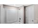 Bathroom with a white shower-tub combo and a white door at 143 Phifer Cir, Kings Mountain, NC 28086