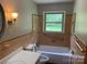 Bathroom with a tub/shower combo, and vintage tile at 1824 Ebinport Rd, Rock Hill, SC 29732