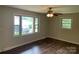 Bright bedroom with large windows offering ample natural light and hardwood flooring at 1824 Ebinport Rd, Rock Hill, SC 29732