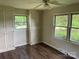 The third bedroom has hardwood floors, natural light from the two windows, and built-in storage at 1824 Ebinport Rd, Rock Hill, SC 29732