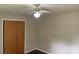 A secondary bedroom with hardwood floors and a wooden closet at 1824 Ebinport Rd, Rock Hill, SC 29732