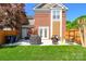 Large, green backyard with a patio, grill, privacy fence, and a well-maintained lawn, perfect for Gathering gatherings at 18524 Mizzenmast Ave, Cornelius, NC 28031