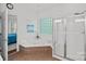 Bright bathroom with a jetted tub, glass shower, and tiled accents at 202 Whitmyre Ct, Fort Mill, SC 29715
