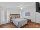 Bedroom featuring neutral walls, hard wood floors, and bright lighting at 202 Whitmyre Ct, Fort Mill, SC 29715