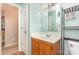 A clean bathroom with a stylish sink, shower, and towel rack offers organized convenience at 228 Grayland Rd, Mooresville, NC 28115