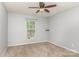 A simple bedroom with neutral carpet, a window, and minimalist style at 228 Grayland Rd, Mooresville, NC 28115