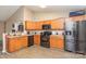 Modern kitchen featuring stainless steel appliances and wood look flooring at 228 Grayland Rd, Mooresville, NC 28115