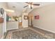 Open-concept living room with hardwood floors that flows to the kitchen at 228 Grayland Rd, Mooresville, NC 28115