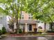 Charming two-story home with a welcoming front porch and well-manicured landscaping at 240 Faust Rd, Davidson, NC 28036