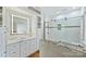 Stylish bathroom featuring custom cabinets, marble counters, and glass enclosed shower at 3009 Brooks Mill Ln, Wingate, NC 28174