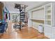 Large walk-in closet featuring custom shelves, drawers, and spiral staircase at 3009 Brooks Mill Ln, Wingate, NC 28174