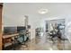 Bright home gym featuring cardio and strength training equipment, and neutral walls at 3009 Brooks Mill Ln, Wingate, NC 28174
