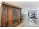 The home gym has exercise equipment and a wood-paneled sauna at 3009 Brooks Mill Ln, Wingate, NC 28174