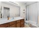 Neutral bathroom with wooden vanity and shower-tub combination at 3030 Priory Ridge Dr, Fort Mill, SC 29707