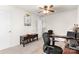 Bright home office with a ceiling fan, neutral carpet, a comfortable chair and practical storage and surface areas at 3030 Priory Ridge Dr, Fort Mill, SC 29707
