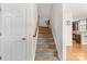 Carpeted staircase leading to the upper level of the home at 3030 Priory Ridge Dr, Fort Mill, SC 29707