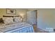 Comfortable bedroom featuring a well-appointed bed and an open doorway to an adjacent room at 3068 Ora Smith Rd, Lincolnton, NC 28092