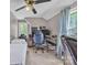 Bright bedroom with soft natural light, ceiling fan, and comfortable bed and workstation at 3101 Hickory Hwy, Statesville, NC 28677