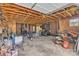 Spacious garage interior with exposed wooden beams and ample storage space at 3101 Hickory Hwy, Statesville, NC 28677