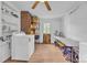 Bright laundry room with modern washer and dryer, ample storage space, and natural light at 3101 Hickory Hwy, Statesville, NC 28677