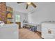 Well-lit laundry room with modern washer and dryer and ample counter space for projects at 3101 Hickory Hwy, Statesville, NC 28677