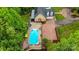 Aerial view of a spacious backyard with an in-ground pool, gazebo, and a home's rear facade at 3125 Arden Way, Claremont, NC 28610