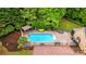 Aerial view of a backyard featuring a pristine in-ground pool and patio furniture at 3125 Arden Way, Claremont, NC 28610