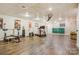 Finished basement with wood-look floors, neutral walls, gym equipment, and a ping pong table at 3125 Arden Way, Claremont, NC 28610