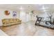 Spacious basement features wood-look floors, neutral walls, and workout equipment perfect for a home gym at 3125 Arden Way, Claremont, NC 28610