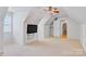 Finished bonus room features a ceiling fan, closet, and access to other areas at 3125 Arden Way, Claremont, NC 28610
