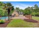 Back exterior view of this house with an in-ground pool, garage, and landscaped yard at 3125 Arden Way, Claremont, NC 28610