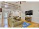 Spacious living room with hardwood floors, staircase, and neutral paint at 3125 Arden Way, Claremont, NC 28610