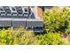 Aerial view shows outdoor deck with seating at 3538 Saker Ln, Charlotte, NC 28211