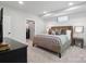 Cozy bedroom showcasing a comfortable bed and an open walk-in closet at 3538 Saker Ln, Charlotte, NC 28211