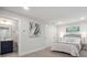 Contemporary bedroom boasts a stylish en-suite bathroom and ample closet space for a serene retreat at 3538 Saker Ln, Charlotte, NC 28211