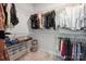 Walk-in closet with shelving, hanging rods, and carpet at 3538 Saker Ln, Charlotte, NC 28211