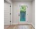 Entryway door leading to a fenced outdoor area at 3538 Saker Ln, Charlotte, NC 28211