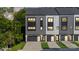 Modern townhome exterior with clean lines and appealing curb appeal at 3538 Saker Ln, Charlotte, NC 28211