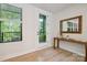 Hallway with natural light streaming in, and a view to the outside at 3538 Saker Ln, Charlotte, NC 28211