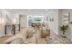 Open-concept living area with hardwood floors, modern decor, and natural light, seamlessly connecting to the kitchen at 3538 Saker Ln, Charlotte, NC 28211