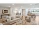 Bright and airy living room featuring modern furniture and hardwood floors, great for entertaining or relaxing at 3538 Saker Ln, Charlotte, NC 28211