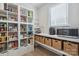 Walk-in pantry with custom shelving and storage baskets, providing ample space for all your kitchen essentials at 3538 Saker Ln, Charlotte, NC 28211
