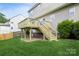 Spacious backyard with a new wooden deck perfect for outdoor entertainment and relaxation at 4015 Amber Leigh Way Dr, Charlotte, NC 28269