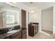 A well-lit bathroom with granite countertops, dual sinks, bathtub, and walk-in shower at 4015 Amber Leigh Way Dr, Charlotte, NC 28269