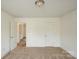 Spacious carpeted bedroom with neutral colors and access to the bathroom at 4015 Amber Leigh Way Dr, Charlotte, NC 28269