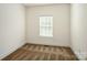 Cozy bedroom featuring neutral carpet and a bright window at 4015 Amber Leigh Way Dr, Charlotte, NC 28269