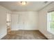 Spacious carpeted bedroom features neutral colors and two doorways at 4015 Amber Leigh Way Dr, Charlotte, NC 28269