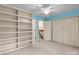Bedroom featuring an open bookcase and large closets at 407 Eastwood Dr, Salisbury, NC 28146