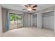 Spacious bedroom with a sliding glass door to the balcony and double closets at 407 Eastwood Dr, Salisbury, NC 28146